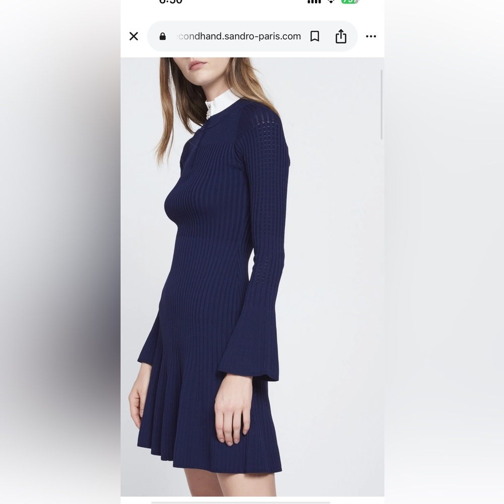 Sandro dress
• Knitted
• Jewelled zip fastening
• Cinched at